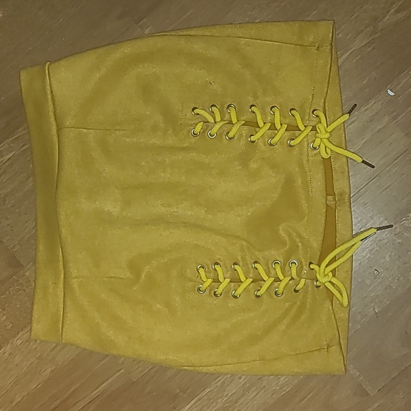 Dresses & Skirts - Faux Suede mini skirt with laces